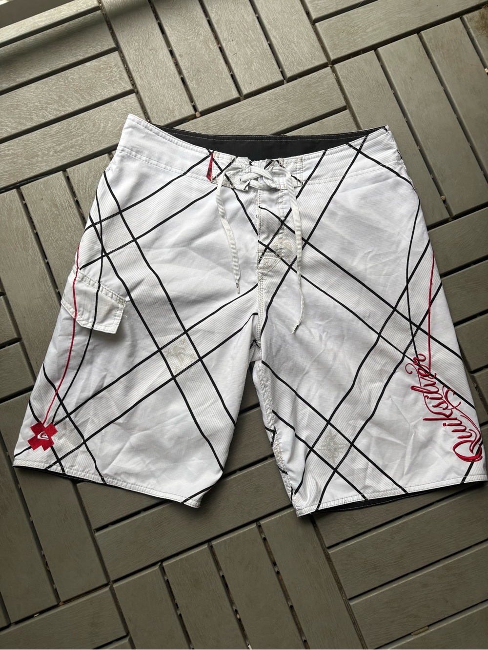 Quiksilver White Plaid Swim Board Shorts with Black Lines and Red Accents